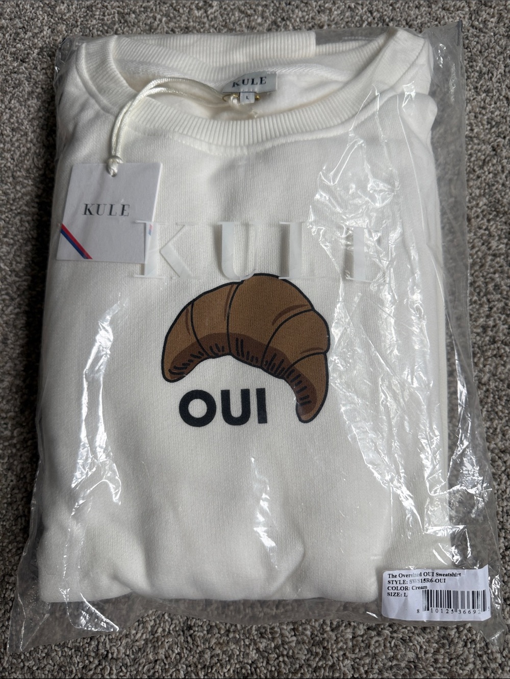 KULE Women’s Off White “OUI" crewneck sweatshirt